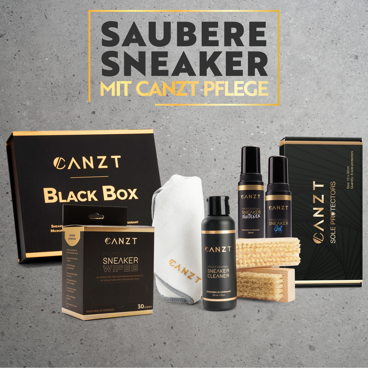 Canzt Black Box mit dem kompletten Inhalt vor grauem Hintergrund